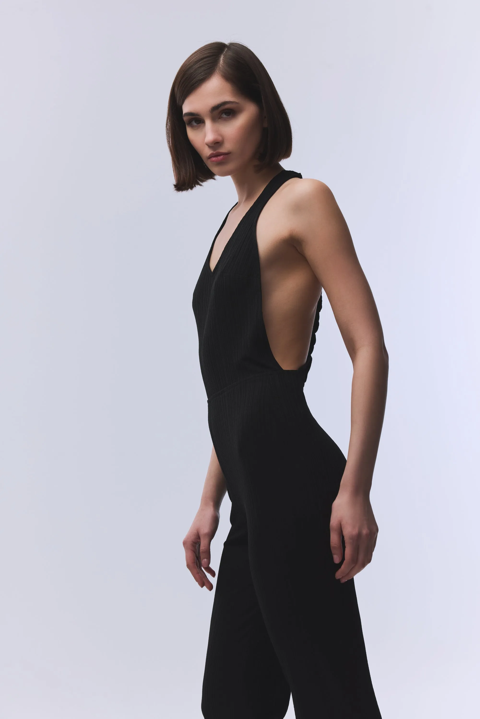 BLACK CRINKLED V-NECK BACK-KNOT DETAILED JUMPSUIT