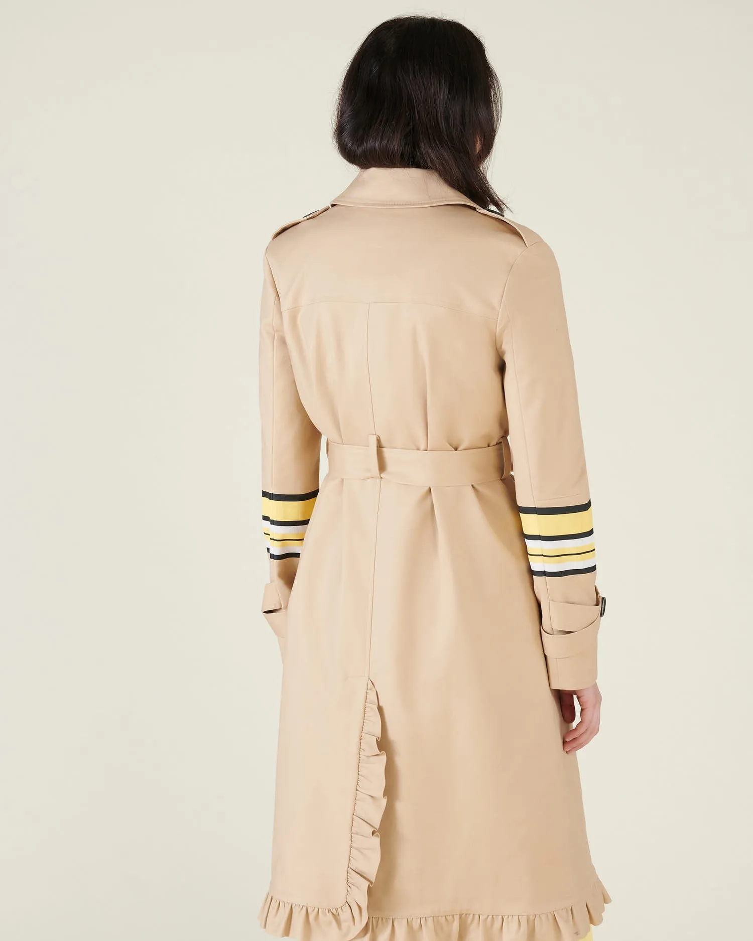 Trench coat with edge with volant